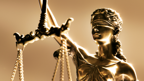 Lady Justice holding scales