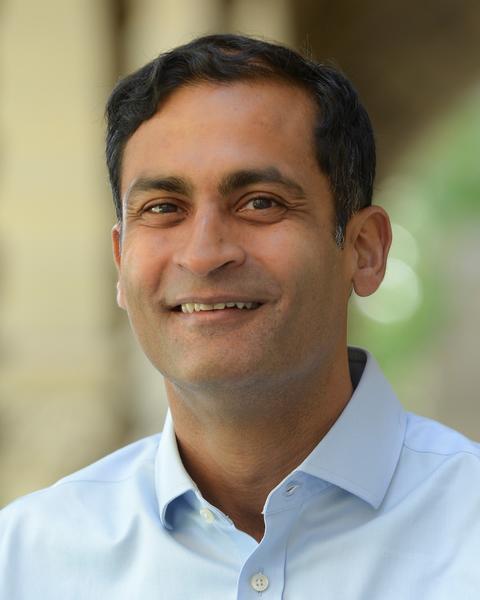 Headshot of Saumitra Jha 